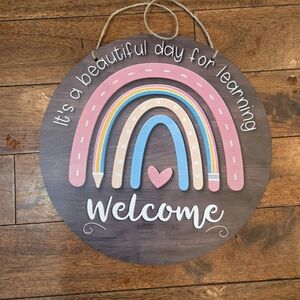 Colorful Rainbow Welcome Sign